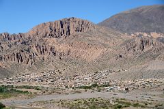 23 The Old Tilcara Town Lies Below Eroded Colourful Hills To The Southwest From Archaeologists Monument At Pucara de Tilcara In Quebrada De Humahuaca.jpg